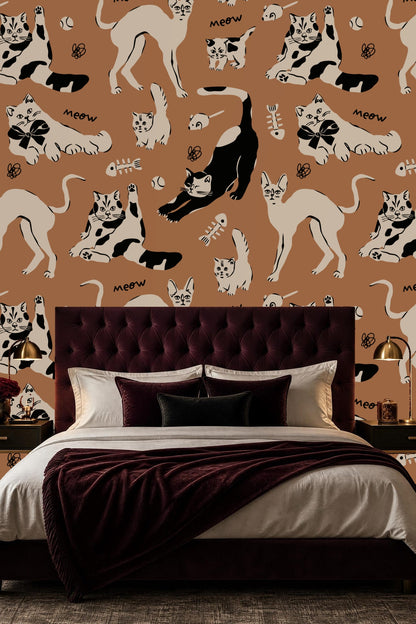 Living room view with sienna wallpaper featuring playful cat illustrations