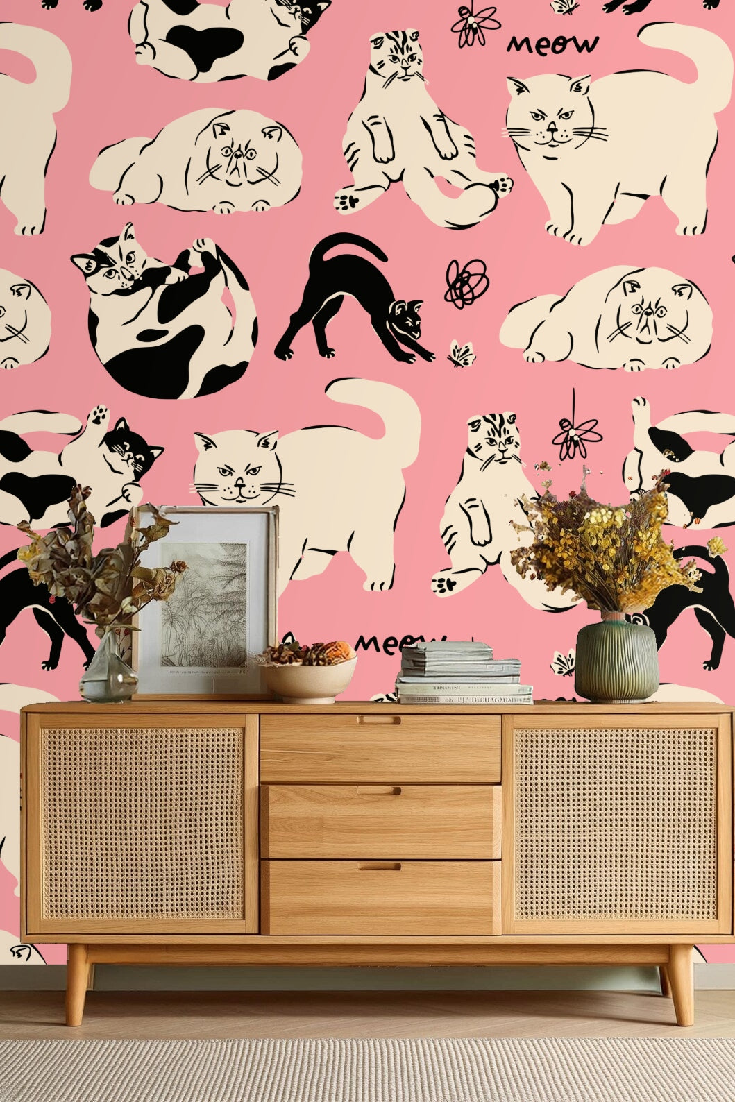 Illustration of simple flowers and fluttering butterflies among cat drawings on wallpaper