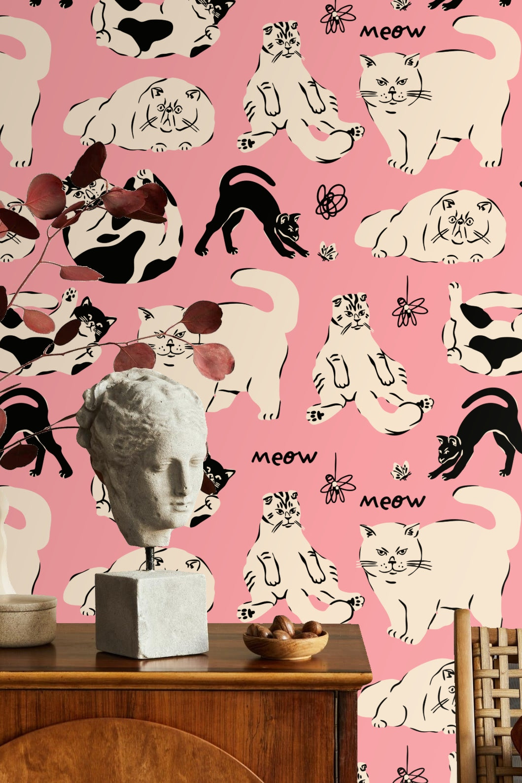 Pattern detail with a variety of feline postures and playful line work embroidery