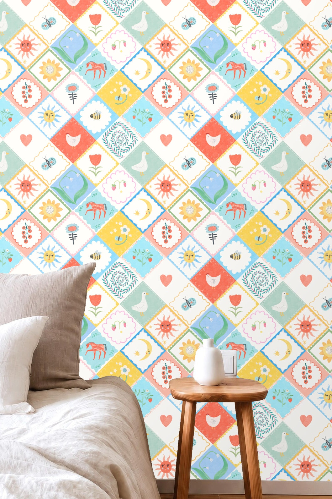 Wallpaper design featuring pastel folk art motifs in diamond tiles