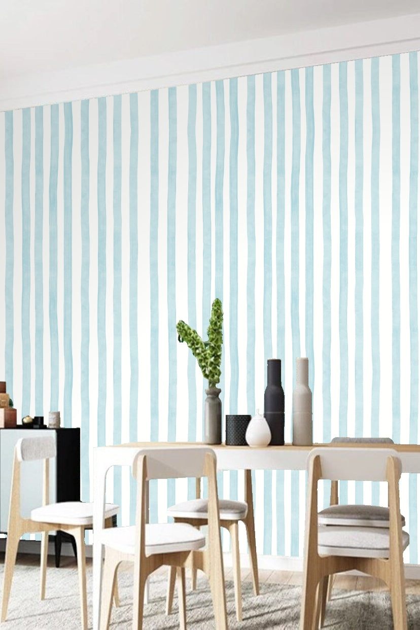 Modern room wall with rippled blue stripes wallpaper and clean white ceiling molding