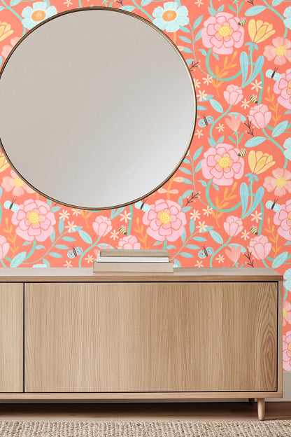 Original artwork showing vibrant coral background with pink and blue flowers, bees, and butterflies