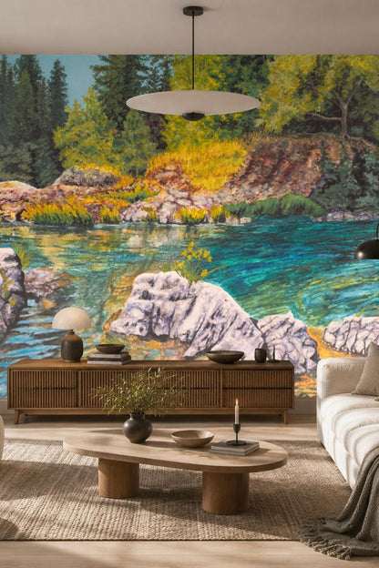 Bright sunlight casts warm glows over river stones and grassy patches in wallpaper pattern.