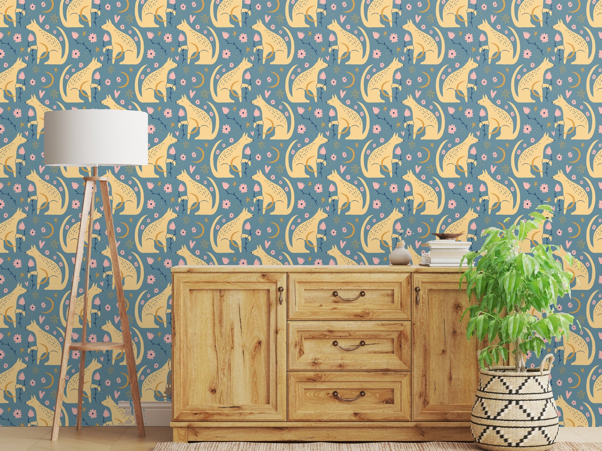 Close crop highlighting decorative dots, floral accents, and the fox silhouette on blue-green field