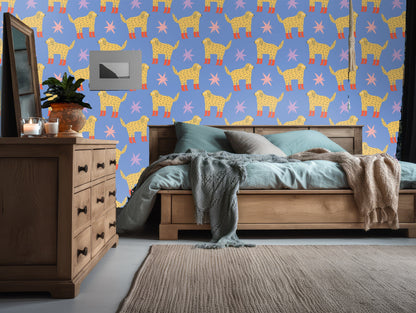 Modern living room mockup with the wallpaper as a bold focal wall behind a teal sofa.
