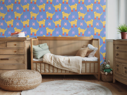 Cozy wood-paneled lounge featuring the pattern above a tufted leather couch for a layered eclectic look.