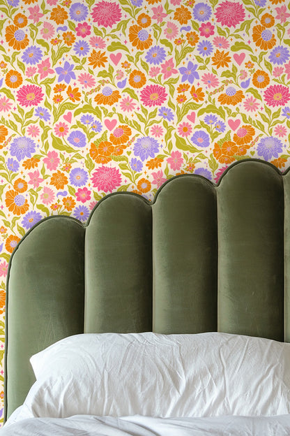 Detailed view of heart shapes integrated among floral elements in the pattern.