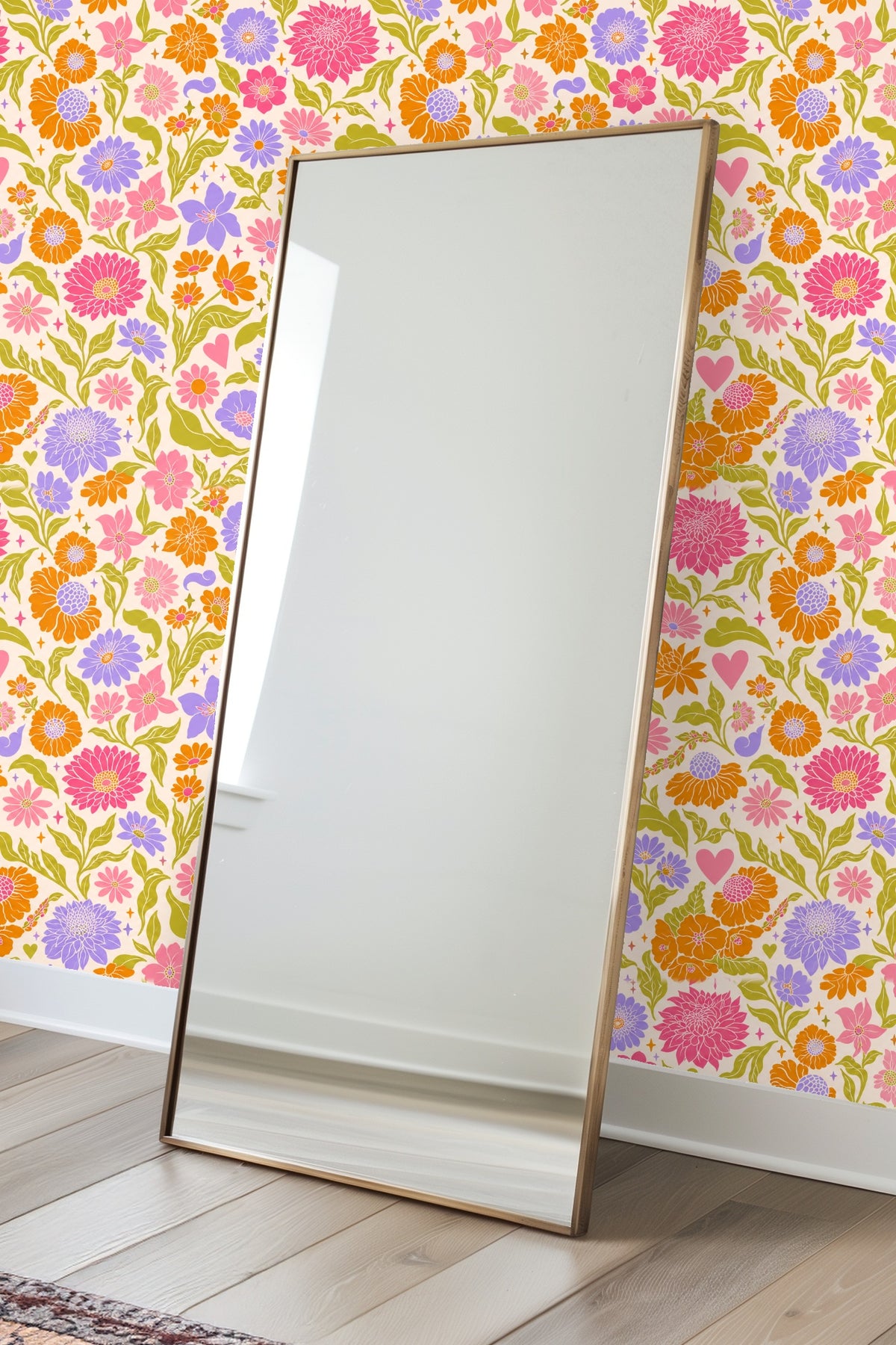 Wallpaper roll revealing floral tile pattern with pink, orange, lavender, and olive green hues on cream base.