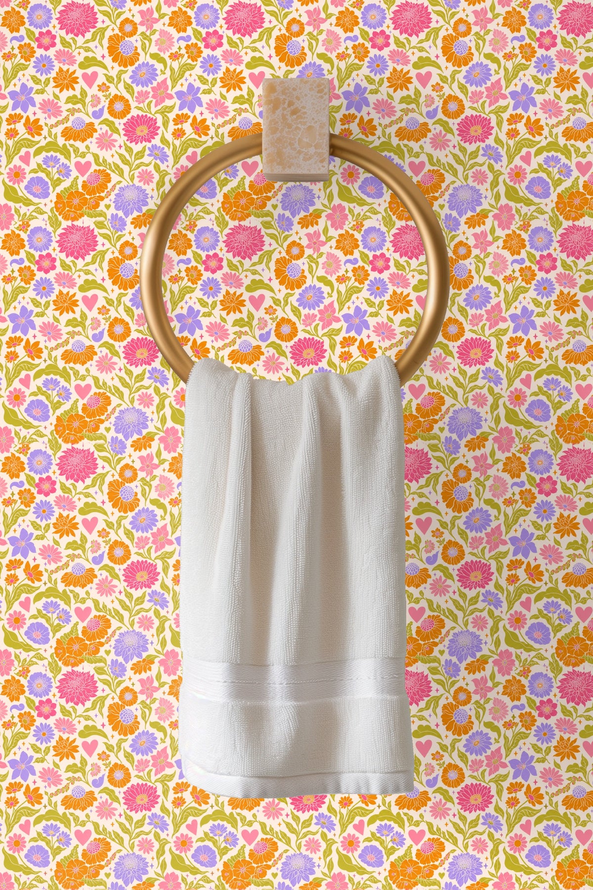 Section of wall with Retro Pop Floral Tile wallpaper lit by natural window light, highlighting flower details.