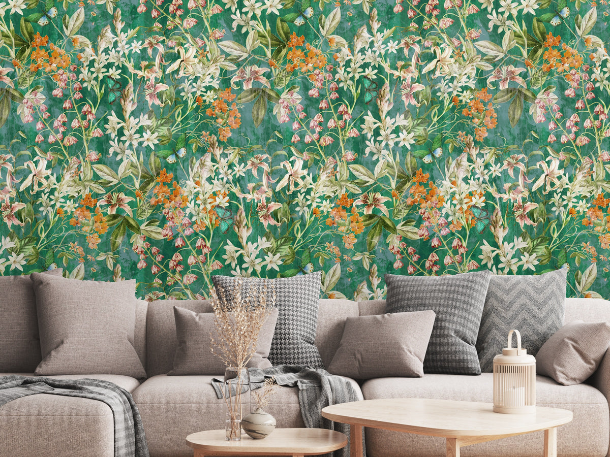 Close-up of the Emerald Conservatory pattern showing lilies, small orange clusters and leafy vines on a textured emerald background.