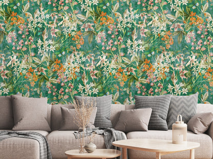 Close-up of the Emerald Conservatory pattern showing lilies, small orange clusters and leafy vines on a textured emerald background.