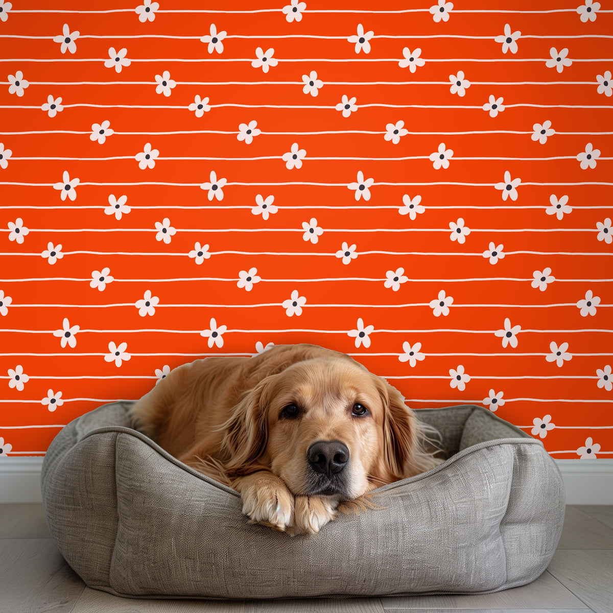Close-up repeat: hand-drawn wavy cream lines with evenly spaced pale daisies on a saturated orange ground.