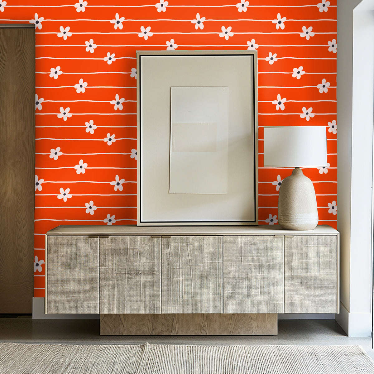 Seated corner: wallpaper framing a cozy chair and lamp, demonstrating the pattern’s scale for a living room accent wall.
