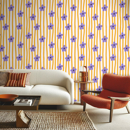 Vaulted ceiling bedroom with wallpaper on the gable wall showing how the vertical stripes accentuate height
