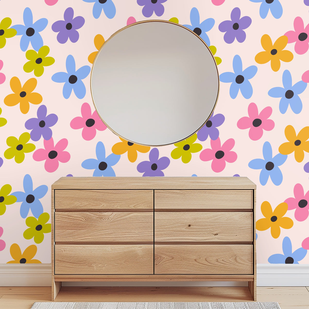 Kitchen or bedside vignette showing floral wallpaper with a candle and small glass bud vase in front.