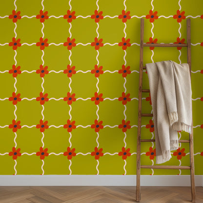 Detail shot of Marigold Lattice pattern behind a leather chair and marble side table illustrating scale