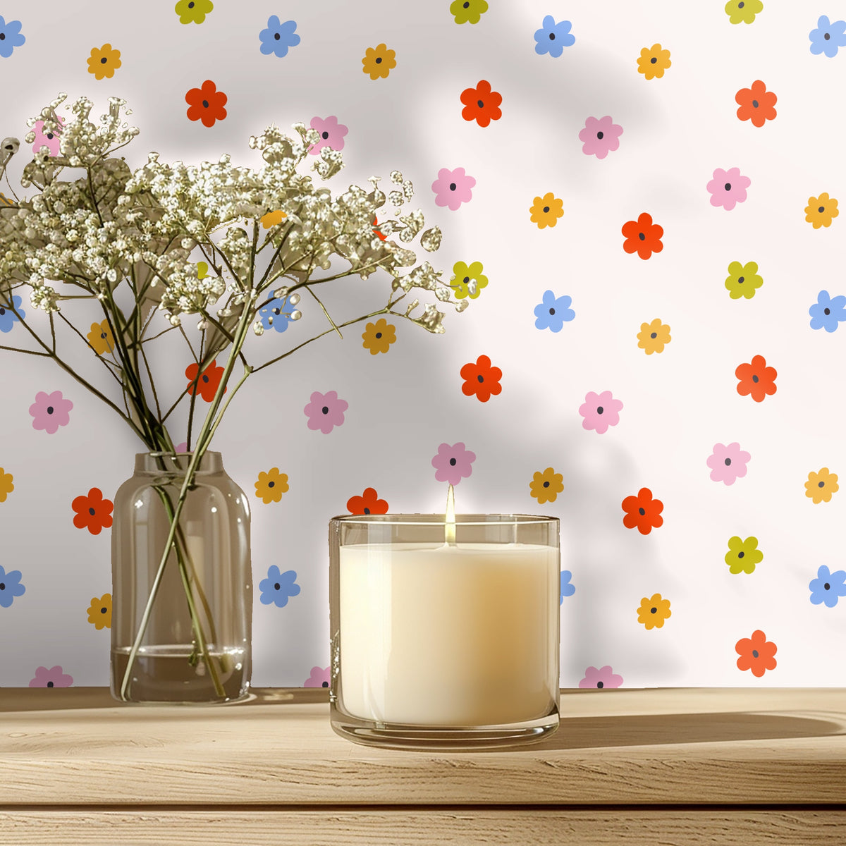 Nursery vignette showing light-wood crib against the Petite Posy wallpaper with evenly spaced colorful posies