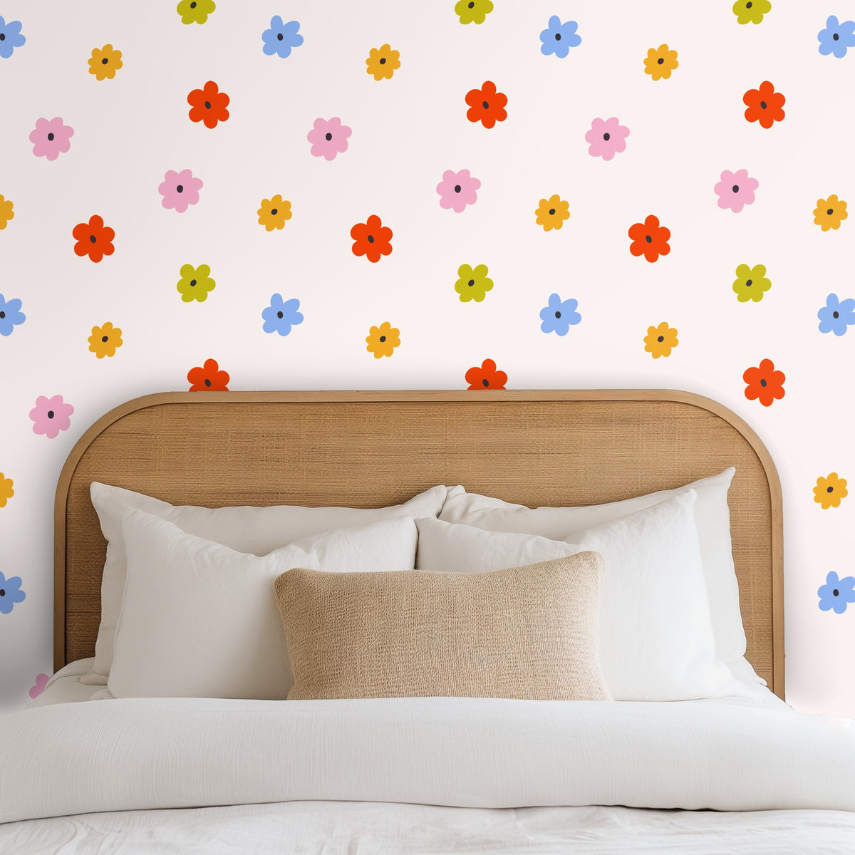 Detail view of the pattern repeat showing single-color petal shapes and small charcoal centers