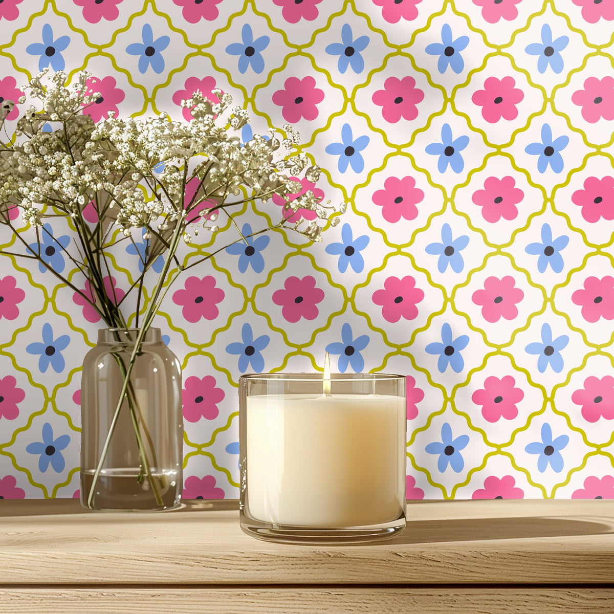 Bedroom vignette with mustard velvet headboard against Petal Lattice wallpaper in pink, blue and olive