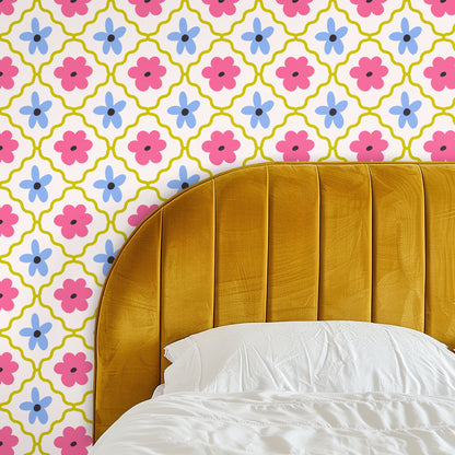 Close-up of Petal Lattice repeat showing hot-pink and soft-blue flowers with olive wavy lattice on a cream background