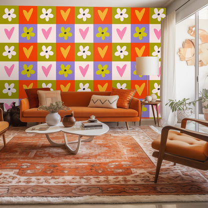 Leather armchair vignette in front of the colorful heart-and-flower checkerboard wallpaper
