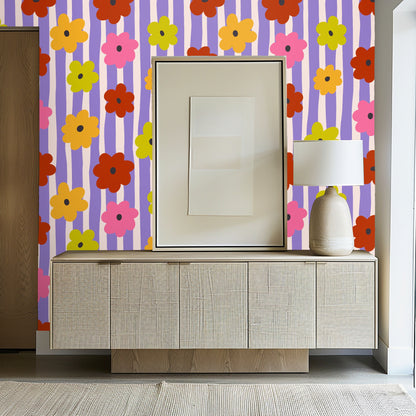 Entryway vignette with a console and lamp against Posy Parade wallpaper, demonstrating the design as an entry accent wall.