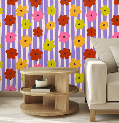 Close-up of the Posy Parade pattern showing lavender and blush vertical stripes with oversized pink, mustard, lime and rust daisies and dark