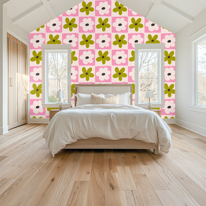 Styled close-up with a lit candle and glass vase in front of Petal Grid wallpaper, highlighting the playful scale and palette.