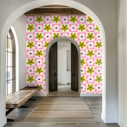 Bathroom scene with an open wooden medicine cabinet mounted over Petal Grid wallpaper, pattern visible behind shelving.