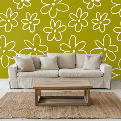 Close-up of oversized hand-drawn daisies in cream outline on a chartreuse-olive background