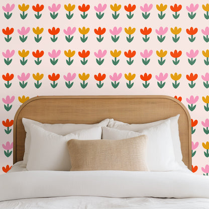 Entryway scene: Tulip wallpaper used as a feature behind a console table, mirror and ceramic lamp