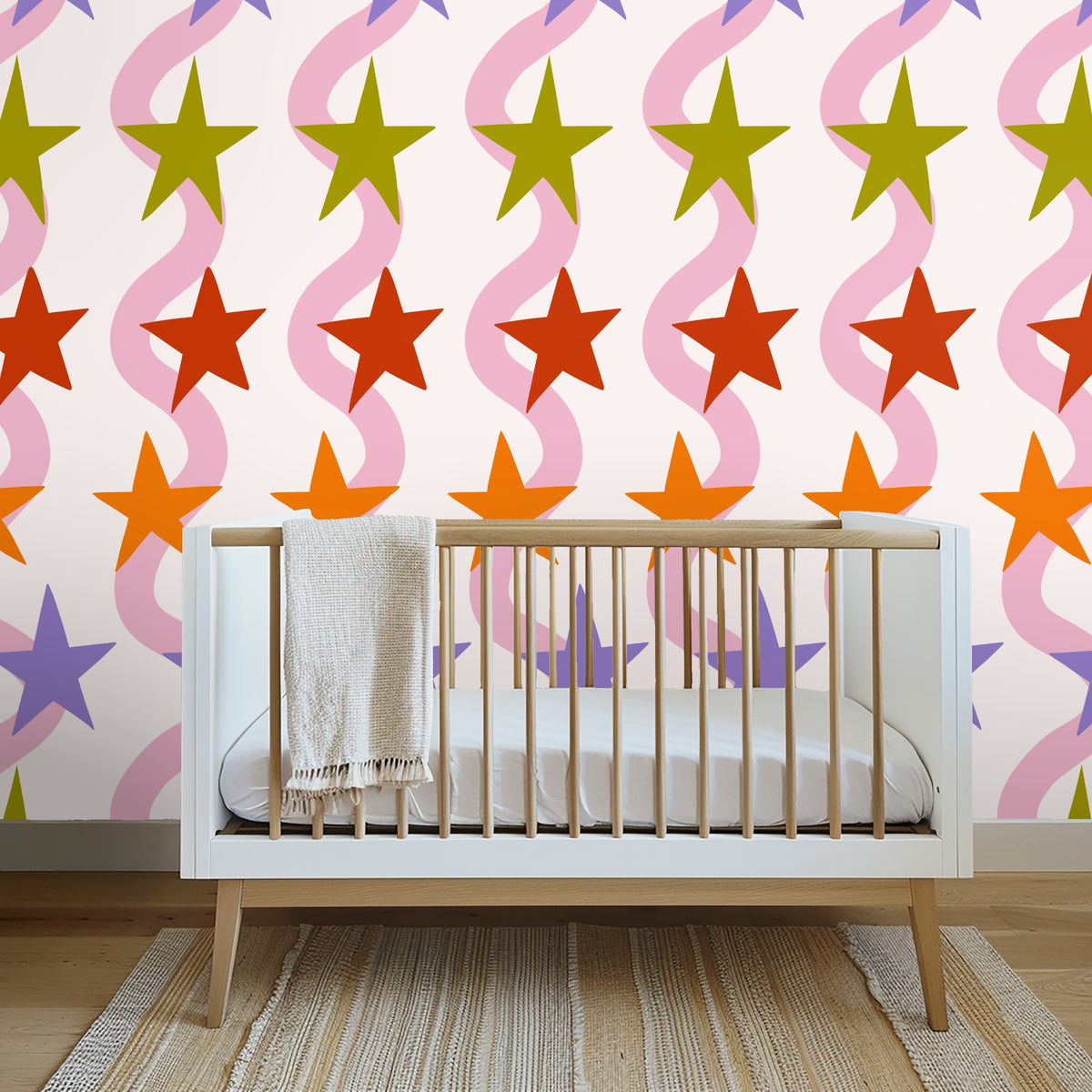 Styled closet and clothing rack placed in front of the wallpaper, showing how pattern complements neutrals