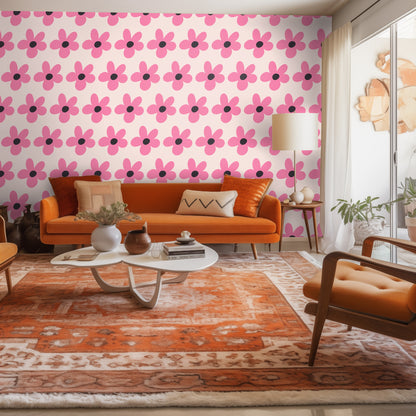 Styled wall with a wooden ladder and draped blanket highlighting the small-scale pink floral repeat