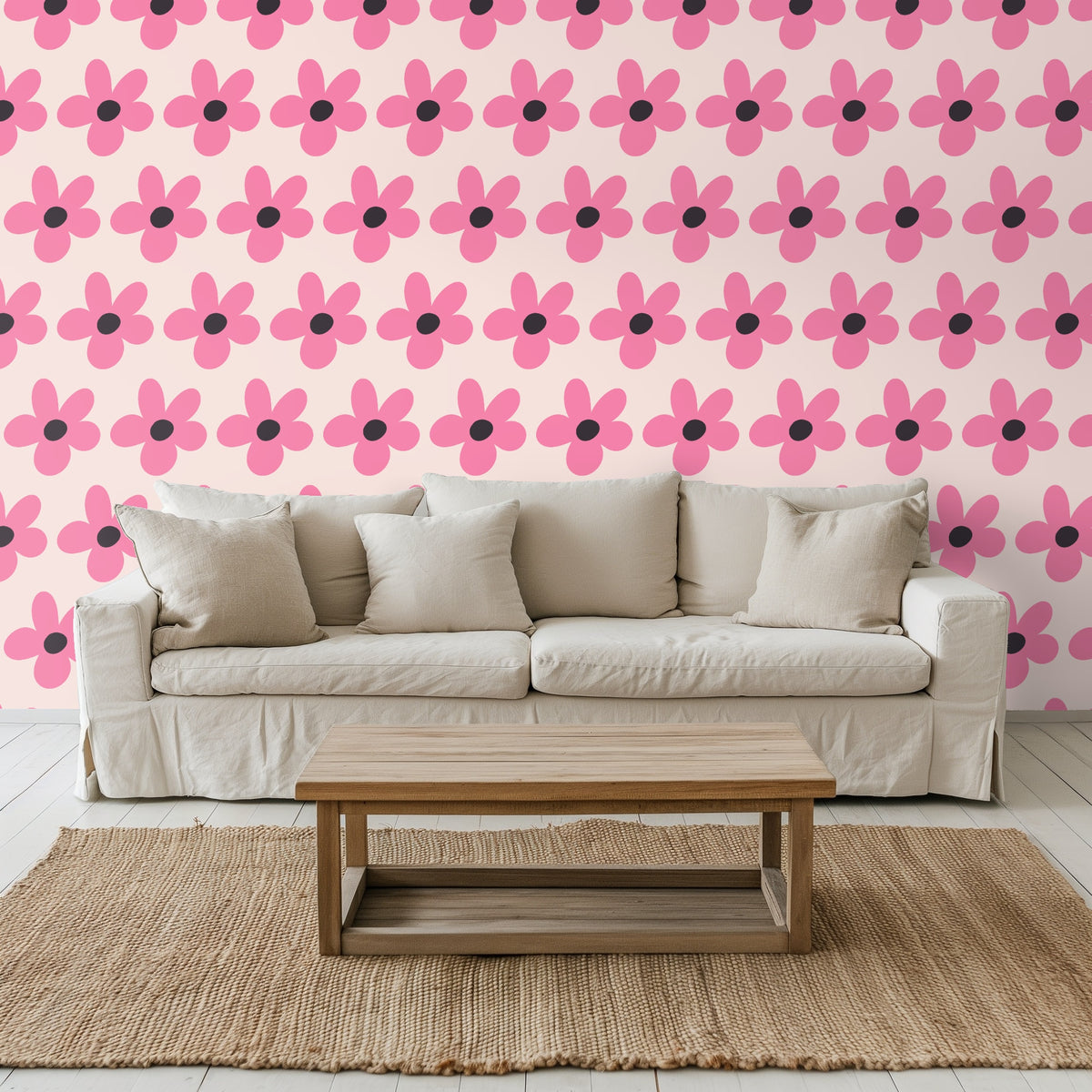 Blue velvet sofa positioned against the wallpaper to show contrast between saturated upholstery and soft blush ground