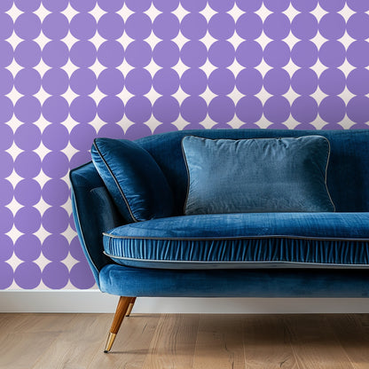 Close-up of the Lilac Orbit wallpaper showing large lavender circular orbs and cream star-shaped negative spaces.