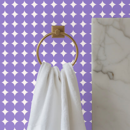 Full-frame repeat shot focusing on the motif and the color contrast between muted lavender and warm cream.