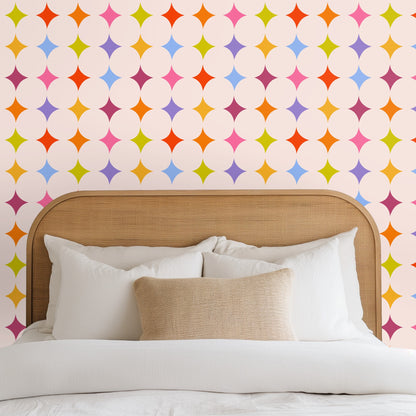 Detail view of the wallpaper repeat showing even spacing and scale of the diamond stars across the blush field