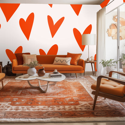 Bedroom vignette with mustard headboard against oversized orange hearts wallpaper.