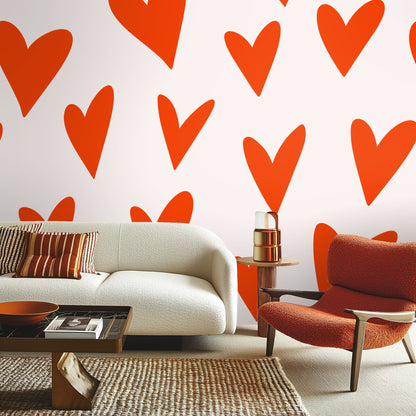 Detail of repeated ember-orange hearts on a soft neutral ground.