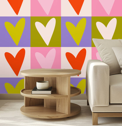 Bathroom scene with an open wooden medicine cabinet mounted over the heart-patterned wallpaper.