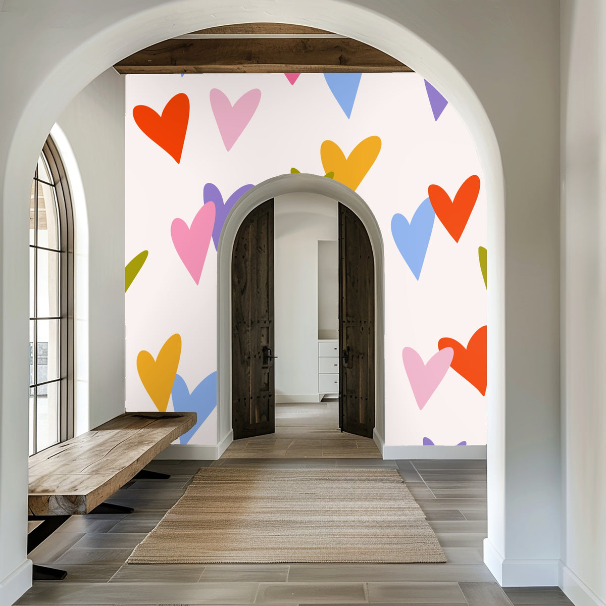 Detail of overlapping hearts—noticeable irregular edges and bold, flat color fields on a pale blush ground