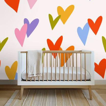 Wide room view showing the pattern scaled as an accent wall behind a bed flanked by windows and light wood floors