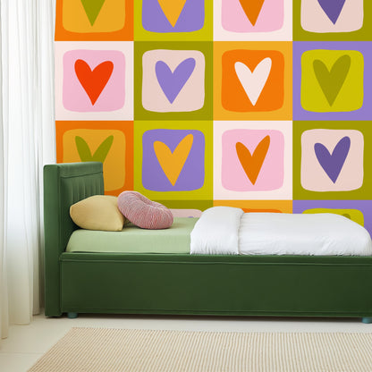 Cropped detail of the pattern highlighting irregular rounded squares and hand-cut heart motif in lavender and olive tones