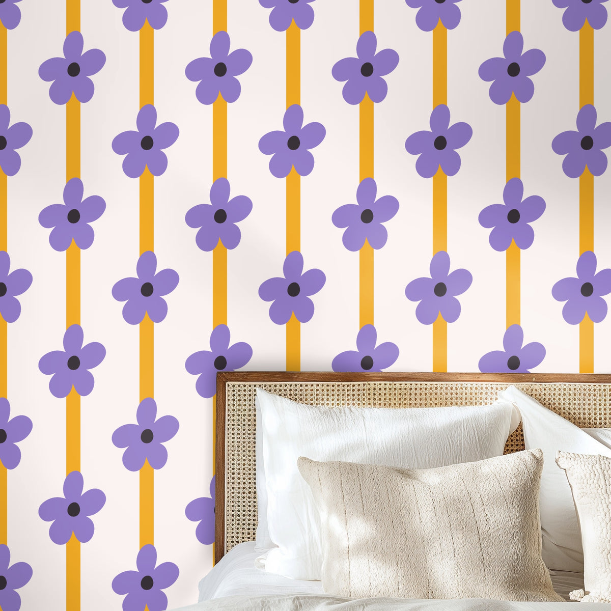 Close view of wallpaper behind a crib, emphasizing the generous scale of the floral repeat