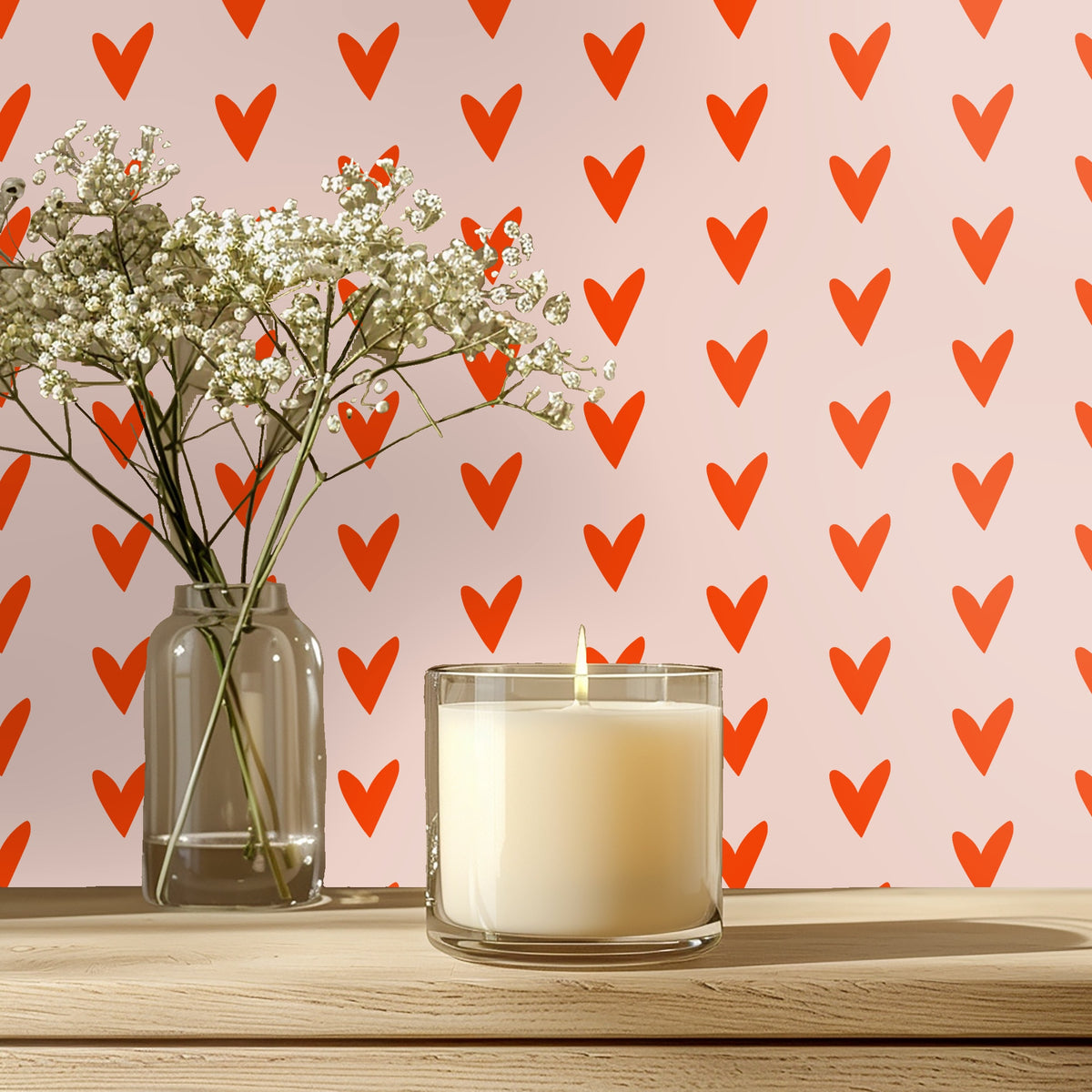Close crop of the Coral Heart Study pattern: red‑orange, hand-drawn hearts on a pale blush background.