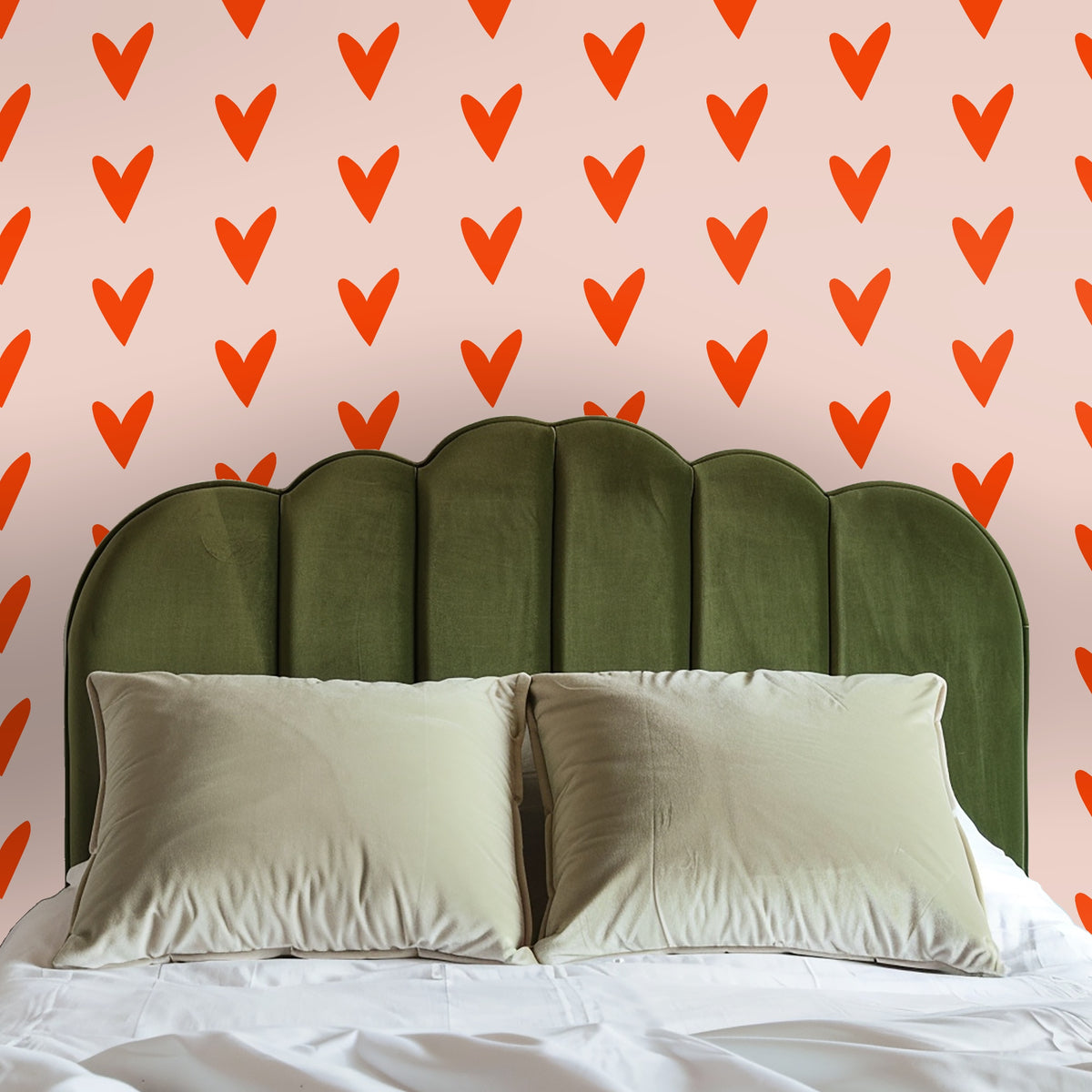 Close crop showing the staggered rows of hand-drawn hearts and the soft blush field.
