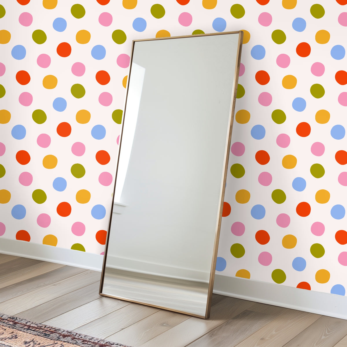 Nursery scene with crib placed in front of Palm Dot Parade wallpaper, colorful dots creating a playful backdrop