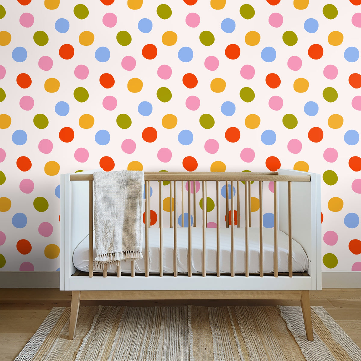 Close-up wall view with leather chair and side table, colorful hand-drawn polka dots on off-white background