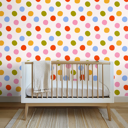 Close-up wall view with leather chair and side table, colorful hand-drawn polka dots on off-white background