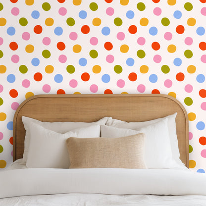 Repeat pattern artwork showing large hand-drawn dots in pink, sky blue, mustard, olive and coral on a warm off-white background